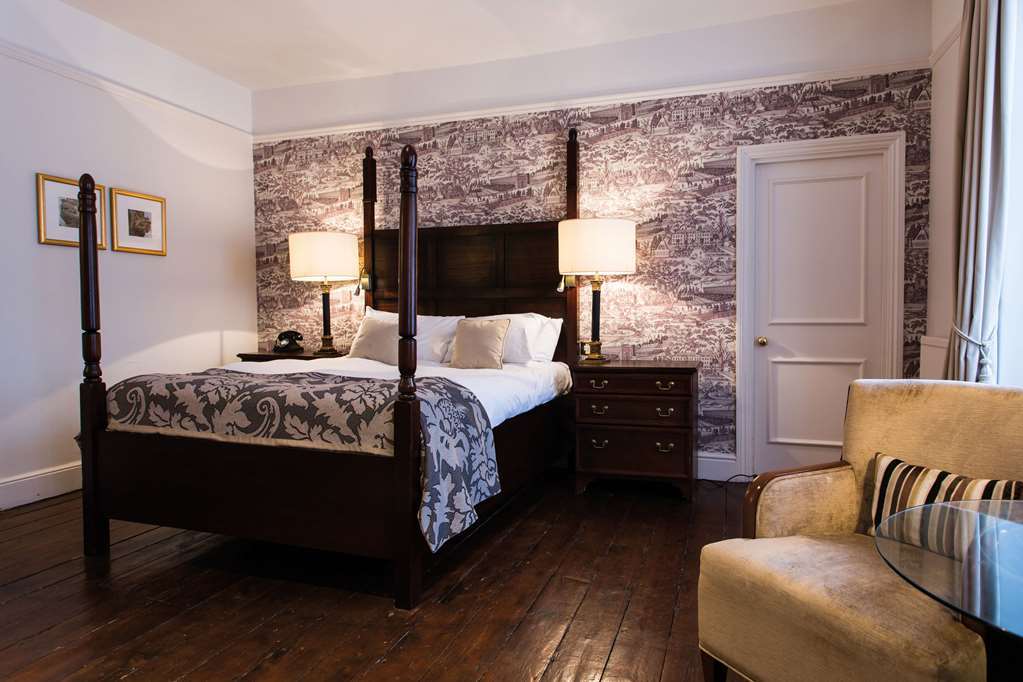 The Fleece At Cirencester Szoba fotó A bedroom at the hotel
